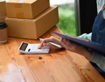 a person using a calculator