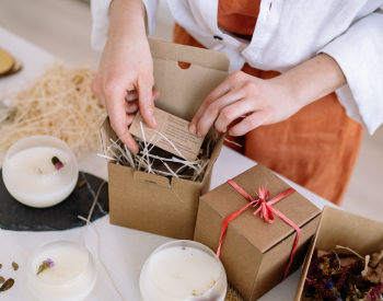 packaging an order and placing a brand card within