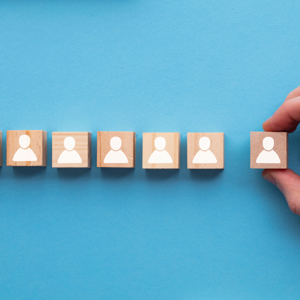 selecting a cube with people drawings on them