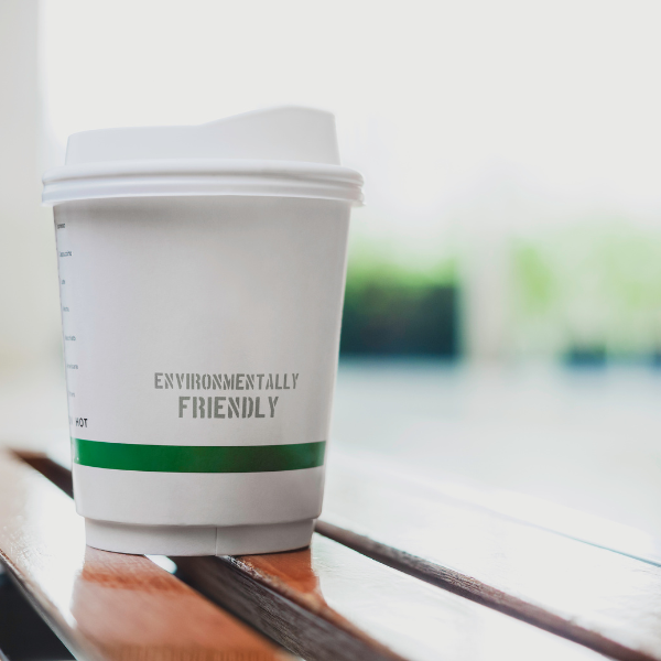 a coffee cup labelled as "environmentally friendly"
