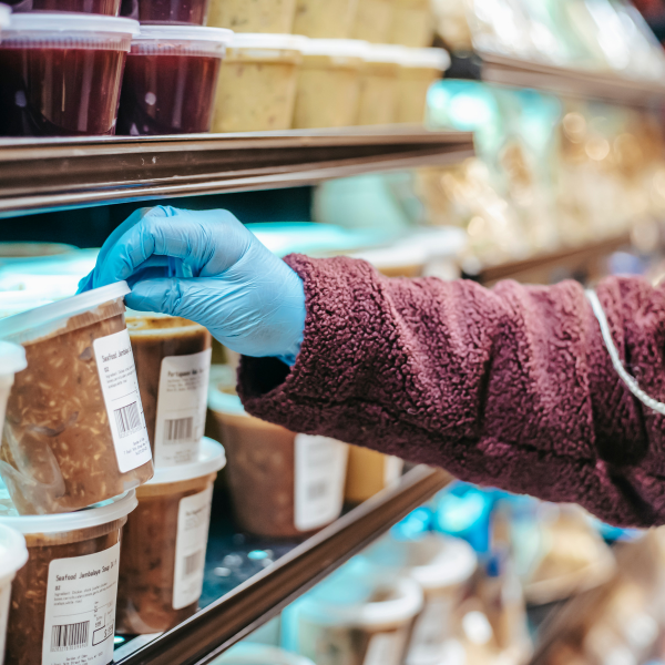 selecting frozen product container from shelf