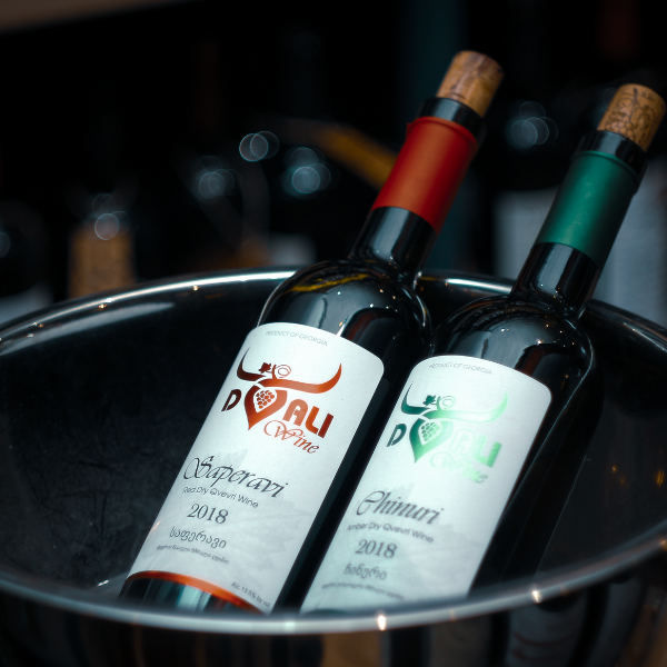 wine bottles placed in  bucket