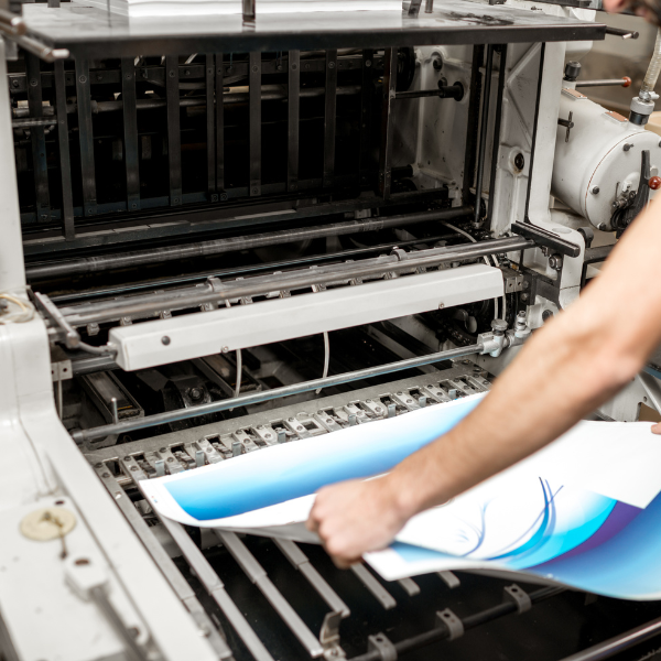 inserting a printing paper inside a printer