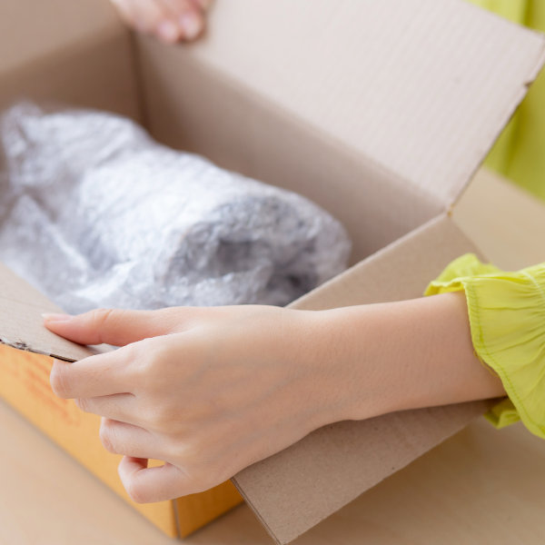 bubble wrapped parcel inside a box