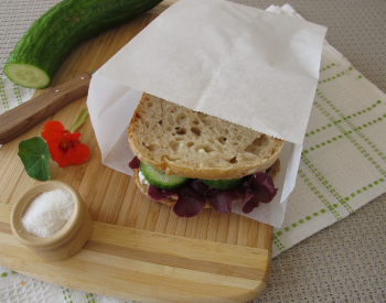 a sandwich in a paper bag